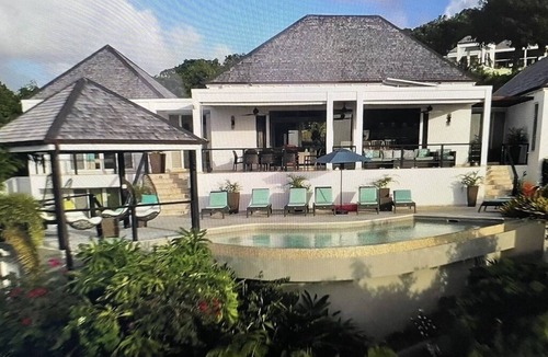 Jolly Harbour Villa | The STUNNING Villa Sea Glass! Located in the gated Sugar Ridge enclave.