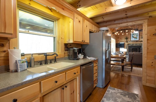 Saluda House | The TrainStation | Secluded Cabin with Large Deck, Waterfall, & Hot Tub!