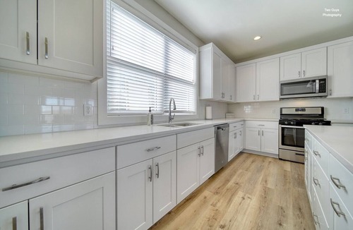 Douglas House | The views & location of this brand-new, luxury condo just can’t be beat! With a