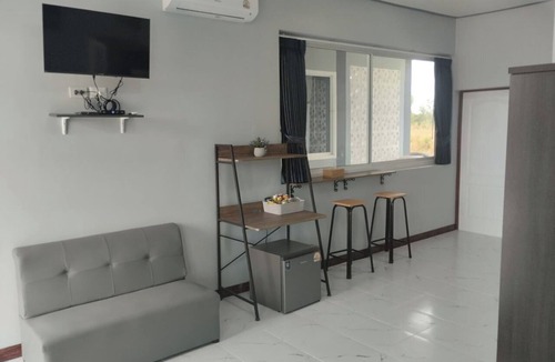Prakhon Chai Hotel | The Village