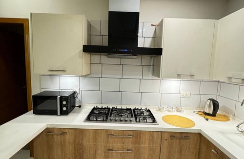 Islamabad Condo | The Walnut: 1BHK Luxury Apt : Self Check-in