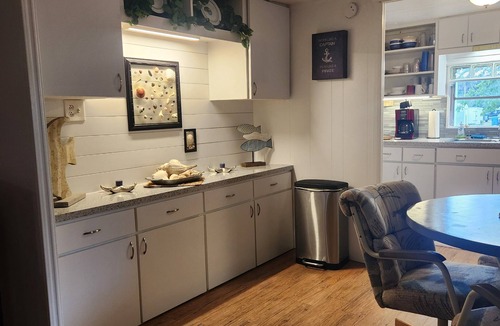 South Waterfront Park House | The Waters Edge 2/1 with Boat Dock in back yard