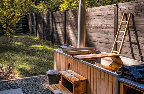 Vashon Island Cabin | The Wolf Den Cozy Cabin Forest Retreat with Wood Fired Hot Tub