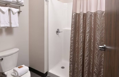 Broken Arrow Hotel | Theme Suite, Stoney Creek Tulsa, Whirlpool, Living Area | 2 Units