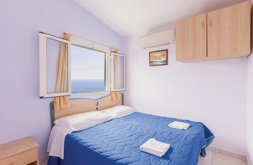 Monte Chiaro Apartment | These bungalows are located in a vacation home complex directly above the sea, with panoramic views