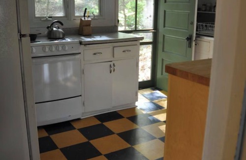 Scandia House | This 1920's river cabin is full of vintage charm. Nestled in a grove of white pines on the banks of the scenic saint croix river, this three bedroom, one bath cabin offers a space designed for rest and simplicity.