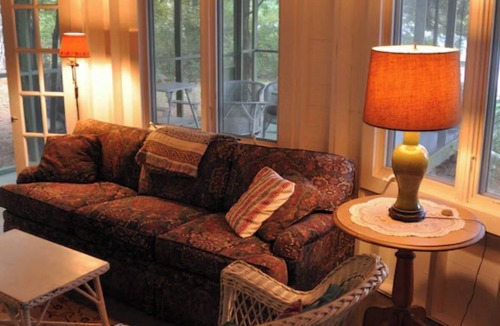 Scandia House | This 1920's river cabin is full of vintage charm. Nestled in a grove of white pines on the banks of the scenic saint croix river, this three bedroom, one bath cabin offers a space designed for rest and simplicity.