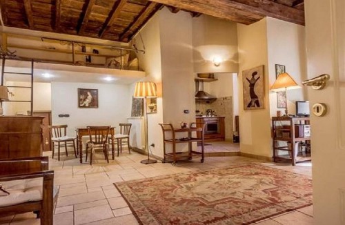 Rione VII Regola Apartment | This 70m2 apartment accommodates 3 people and is located on the first floor of a historic building without a lift, which can be accessed by passing through the internal cloister.It is located in the center of Rome, in a perfect spot for visiting the city
