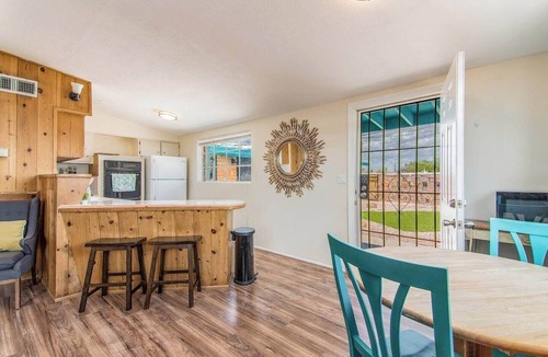 Midtown Apartment | This centrally located 1 bedroom features a full size pool and electric vehicle charging on site.