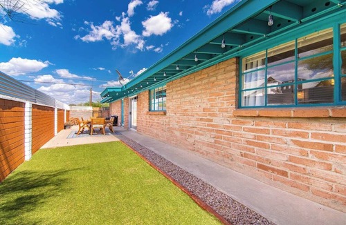 Midtown Apartment | This centrally located 3 bedroom 2 bathroom features a full size pool and electric vehicle charging on site.