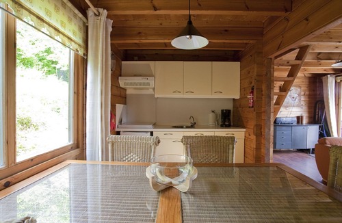 Bournoufay House | This charming two-story wooden Finnish chalet accommodates up to 5 people in two bedrooms for a cozy retreat in the heart of the Ardennes.