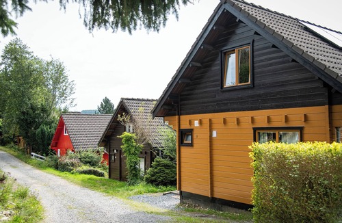 Bournoufay House | This charming two-story wooden Finnish chalet accommodates up to 5 people in two bedrooms for a cozy retreat in the heart of the Ardennes.