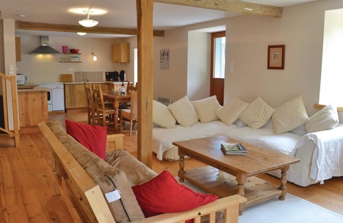 Treignac House | This charming vacation home, a converted barn, is located a stone's throw from the village center of