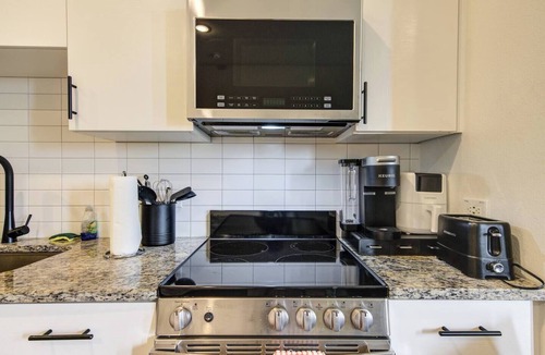 Washington Ave./ Memorial Park Apartment | This inviting living space is the perfect spot to relax and unwind
