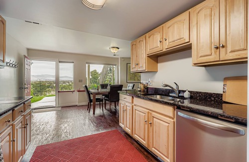 Lakewood Ski Chalet | This is a serene space. Open landscape of a lush garden, mountains, and beyond!
