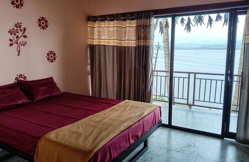 Hireguthi House | This is river front farm stay Morning sunrise is seen inside of the rooms