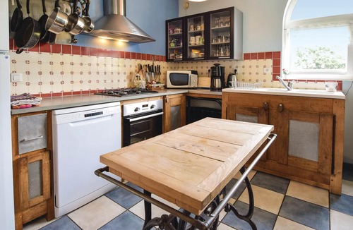 Ancourteville-sur-Hericourt House | This large cottage has an open fireplace.
