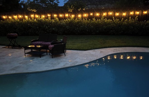 Lake Worth House | This modern 4-bedroom home sleeps 8 with 5 beds, 2 baths & a private pool.