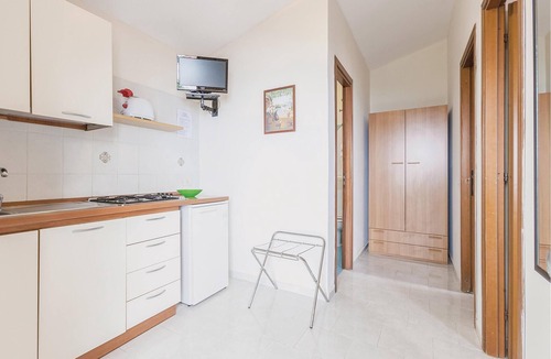 Monte Chiaro Apartment | This modern bungalow belongs to a vacation home complex directly above the sea, with a unique panora