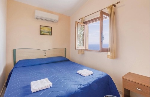 Monte Chiaro Apartment | This modern bungalow belongs to a vacation home complex directly above the sea, with a unique panora