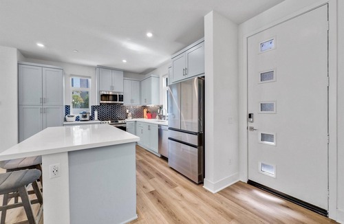 Irvine House | this newly built, fully furnished tri-level home awaits your arrival.
