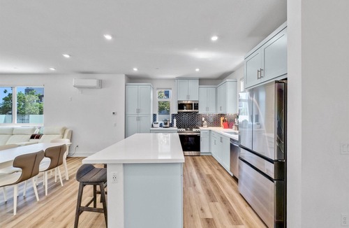 Irvine House | this newly built, fully furnished tri-level home awaits your arrival.