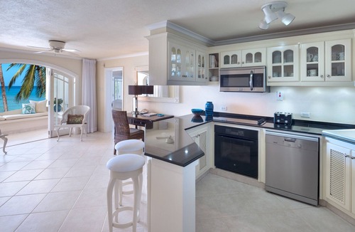 Reeds Bay Condo | This Penthouse is situated directly on a beautiful sandy beach and has a wonderful roof deck terrace