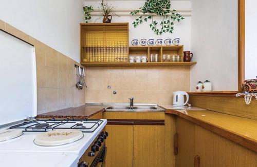 Medveja Apartment | This spacious apartment with simple furnishings is located in a family house far from busy roads and