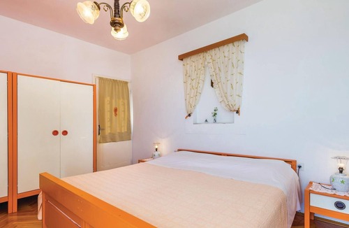 Medveja Apartment | This spacious apartment with simple furnishings is located in a family house far from busy roads and