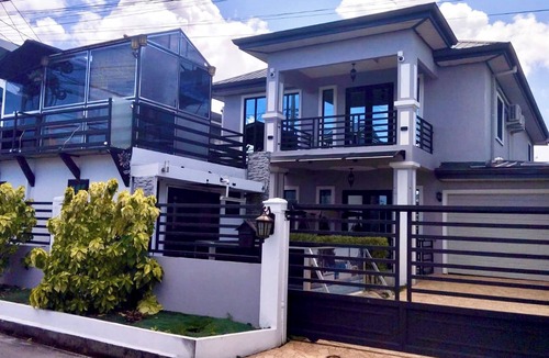 Claxton Bay House | This spacious property features a fully equipped kitchen, and an inviting small pool