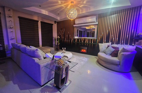 Claxton Bay House | This spacious property features a fully equipped kitchen, and an inviting small pool