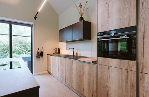 Ouddorp House | This stylish and luxurious holiday home near the sea is perfect for families and all seasons. With a spacious garden and modern kitchen, you’ll enjoy peace, comfort, and quality time together.