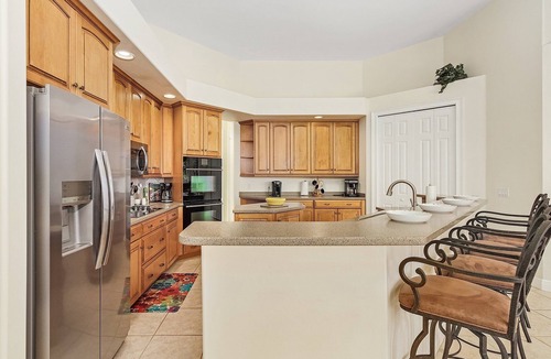 Pelican Villa | This Villa has it all! Waterfront - heated pool, hot tub, boat dock, tiki hut!