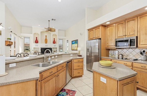 Pelican Villa | This Villa has it all! Waterfront - heated pool, hot tub, boat dock, tiki hut!