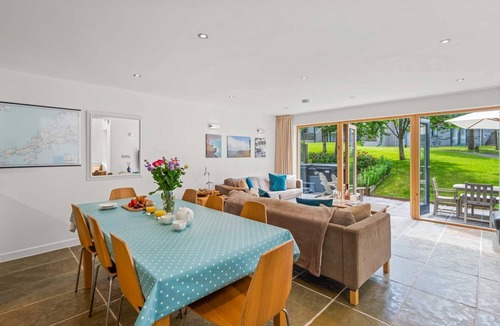 Talland House | This wonderfully light open-design, pet friendly house overlooks the charming natural pool and is cl