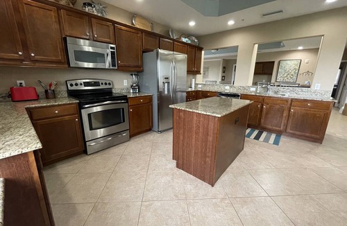 Live Oak Landings Condo | Three Bedroom Condo with Elevator and Views of Gulf and Lemon Bay Boats welcome