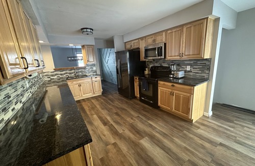 Waldo House | Three bedroom ranch style pet friendly home with a patio & theatre room!