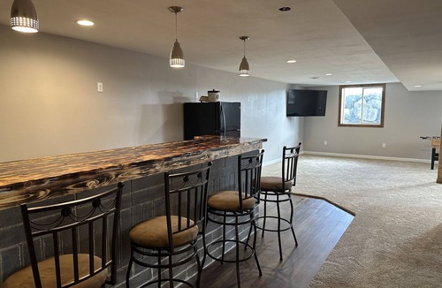 Waldo House | Three bedroom ranch style pet friendly home with a patio & theatre room!