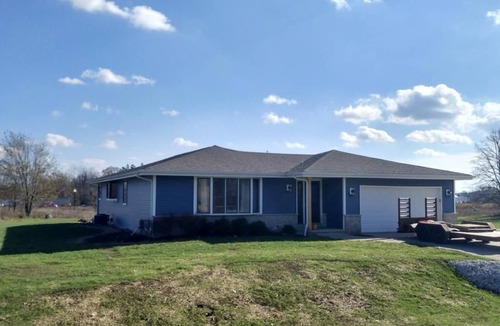 Waldo House | Three bedroom ranch style pet friendly home with a patio & theatre room!