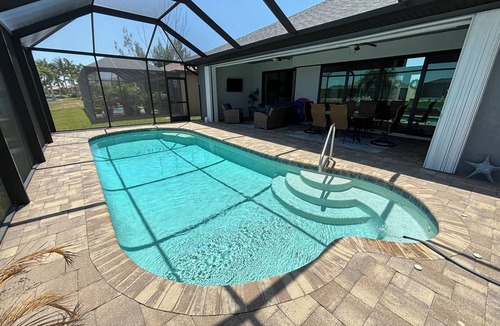 South Gulf Cove House | THREE PALMS PARADISE! Modern, 3-Bedroom Home, that sleeps 12. Port Charlotte, FL