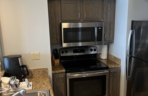 Palm Beach Shores Apartment | Three pools - Beach Access - Full Kitchen & Living Room