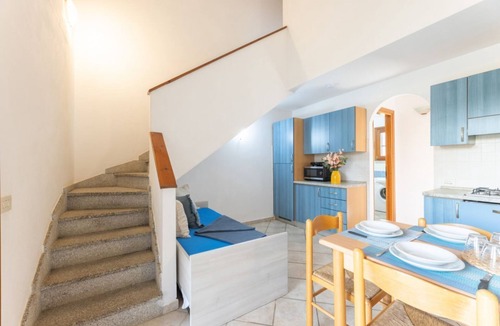 Budoni Apartment | Three-room apartment 6/7 beds, two bathrooms, 43/50 sqm c. To. Arranged on two levels: on the ground floor equipped patio, living room with equipped kitchenette and double sofa bed, bedroom with bunk bed, bathroom. On the first floor double b