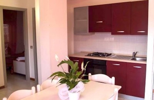 Luni Mare Apartment | Three-room apartment of 55 sqm, consisting of a large living/dining area with equipped kitchenette and sofa bed with 2 pull-out single beds, a double bedroom, a bedroom with 2 single beds, bathroom with shower and private balcony complete with table and
