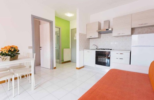 Luni Mare Apartment | Three-room apartment of 55 sqm, consisting of a large living/dining area with equipped kitchenette and sofa bed with 2 pull-out single beds, a double bedroom, a bedroom with 2 single beds, bathroom with shower and private balcony complete with table and