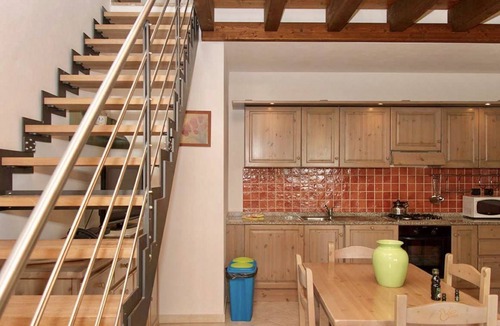 Santa Maria La Palma Apartment | Three-room apartment of 60 square meters, at ground floor and arranged on two levels. Comprising a living room with a sofa bed for two people, a fully equipped kitchenette. Two bedrooms and a bathroom with shower upstair.Splendid terrace with a view, ide