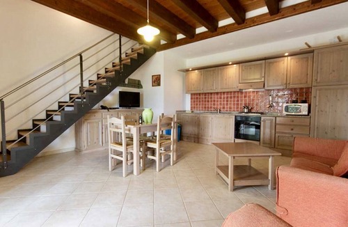 Santa Maria La Palma Apartment | Three-room apartment of 60 square meters, at ground floor and arranged on two levels. Comprising a living room with a sofa bed for two people, a fully equipped kitchenette. Two bedrooms and a bathroom with shower upstair.Splendid terrace with a view, ide