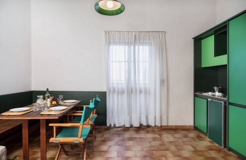 Teulada Apartment | Three-room apartment with sea view of approximately 62 m2 with air conditioning on the ground floor consisting of a large living room, kitchenette with electric hobs, fridge and TV.On the first floor we have two double or twin bedrooms with internal sink