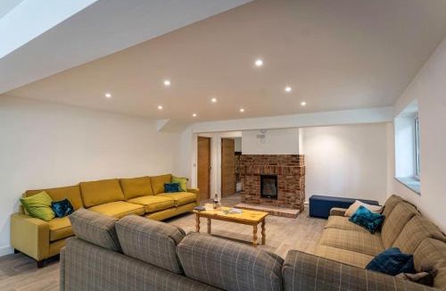 Farley House | Throwley, woodland lodge with hot tubs for 14