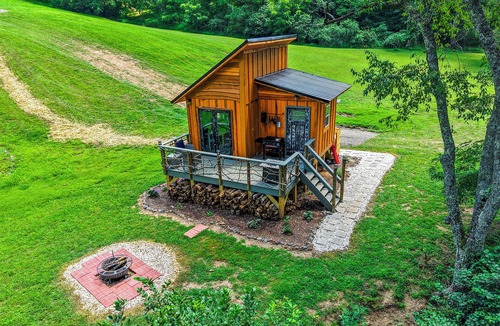 Hillsville Cabin | Tiny cabin sits by a bubbling, stocked creek. Pet friendly for a fee, hot tub