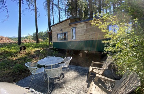 Husum House | Tiny house on 6 quiet acres with outdoor nsteam sauna, and views. Pet friendly!